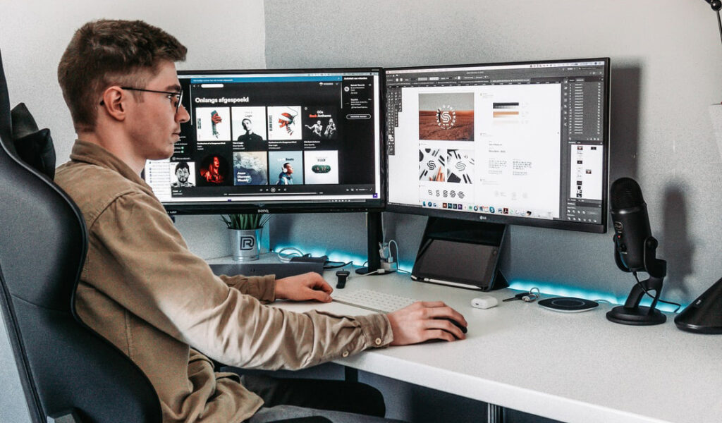 Clean desk with multiple monitors